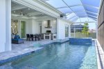 Outdoor Pool and Patio with Spa and Outdoor Kitchen